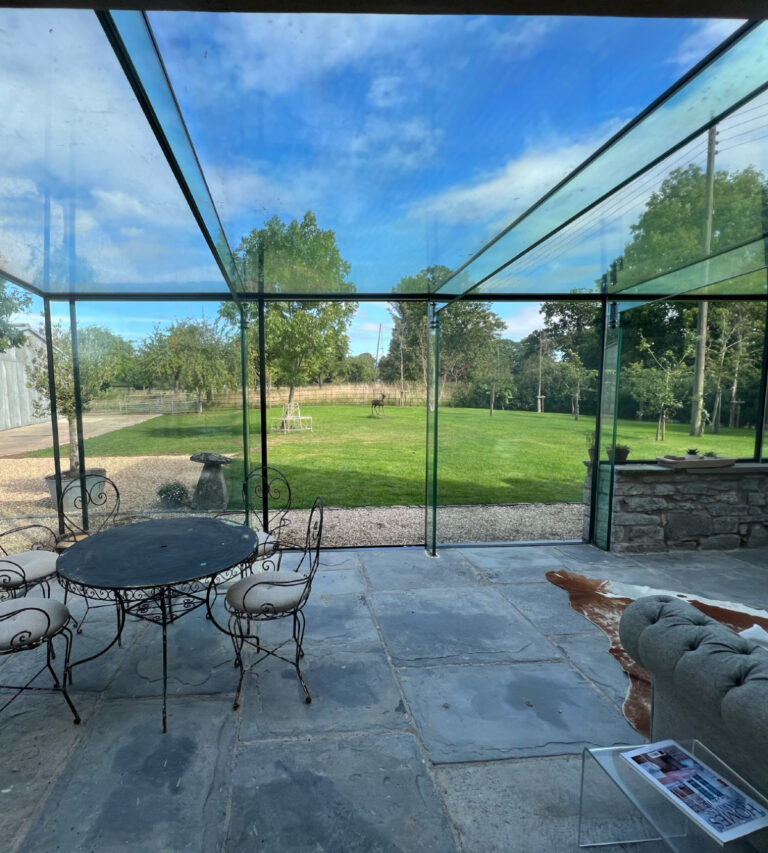 interior-view-of-glass-room-extension-on-sunny-day-sq
