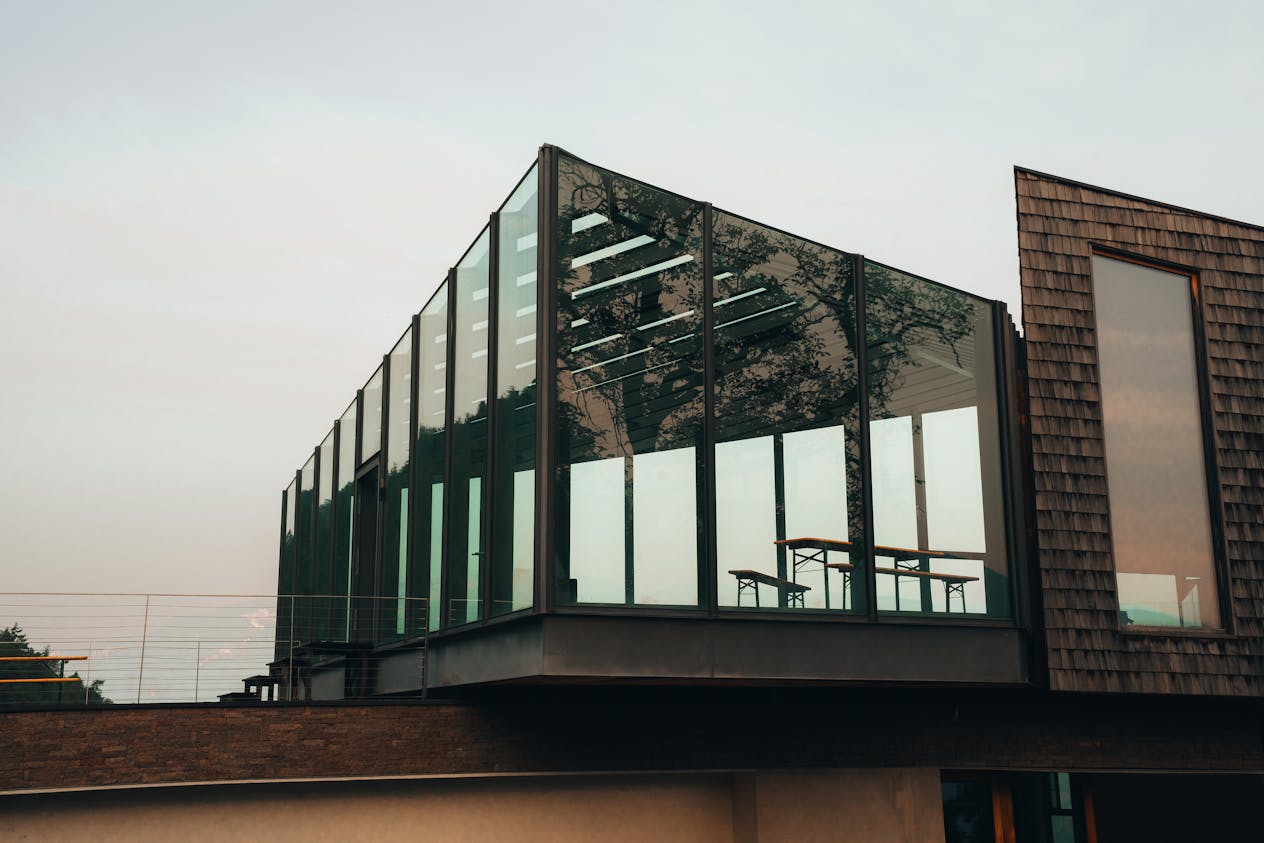 A sleek, contemporary building with glass architecture in Trentino-South Tyrol, Italy.